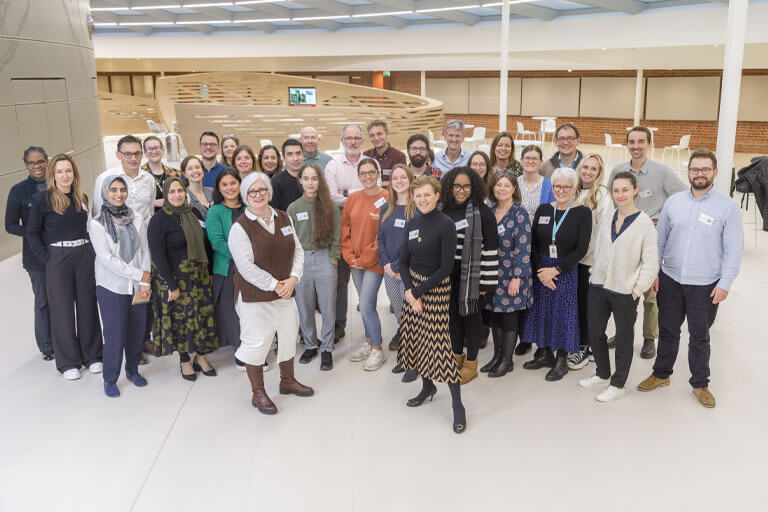 The participants, researchers and organisers of the IBD Bioresource meeting, held at the Wellcome Genome Campus.